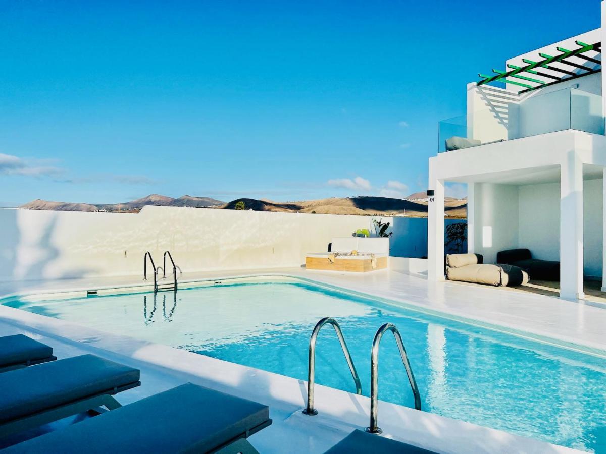 Cih Apartments ปูแอร์โตเดลคาร์เมน ภายนอก รูปภาพ