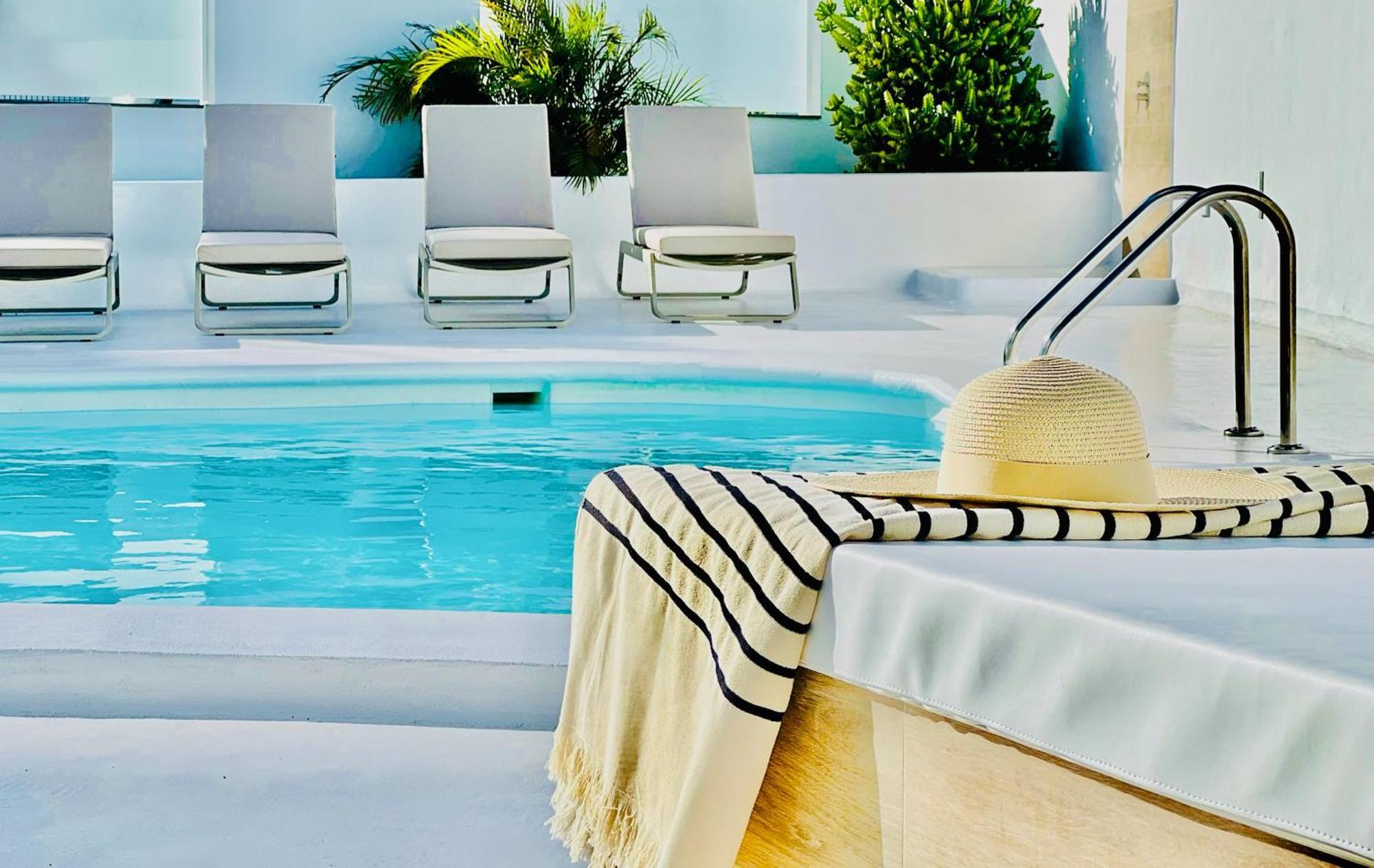 Cih Apartments ปูแอร์โตเดลคาร์เมน ภายนอก รูปภาพ